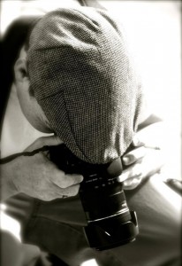 Photo of Joe Sturges holding a Canon digital camera in New York City - Photo by justberg.com